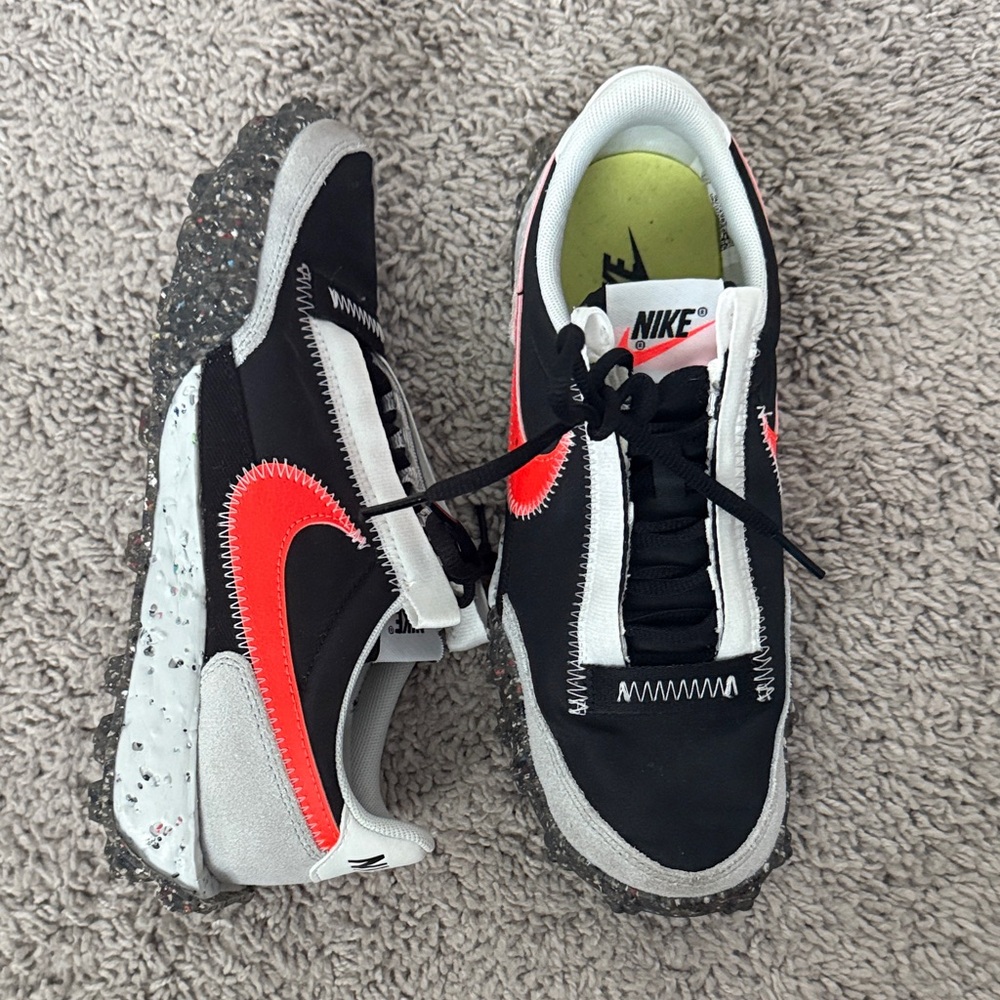 Nike Black and Orange Sneakers with Speckled Sole